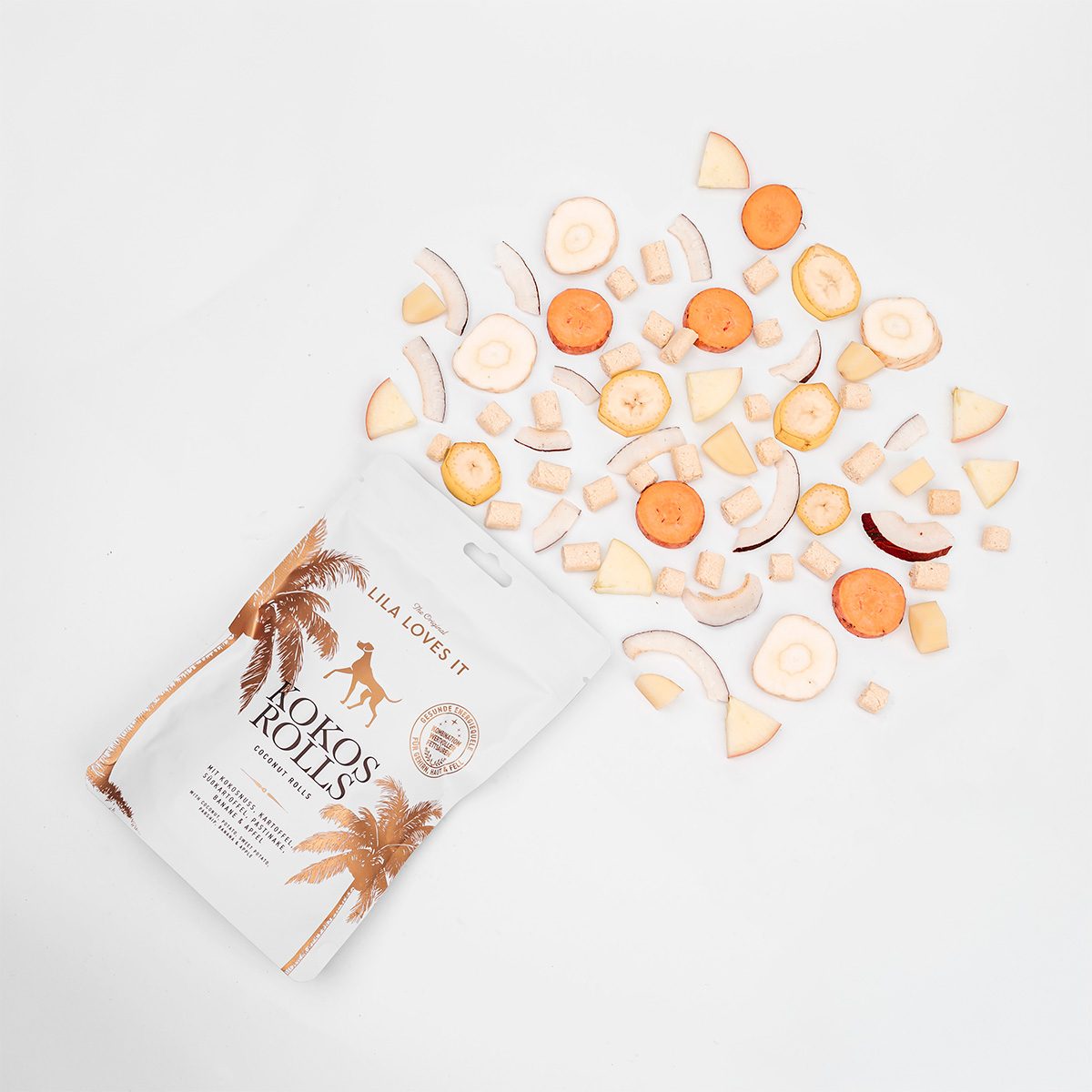LILA LOVES IT Kokos Rolls 200 g – Kokos-Snacks mit Zutaten auf hellem Hintergrund